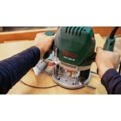Bosch Oberfräse POF 1200 AE (1200 Watt, Spannzangen, Fräser (8 Mm), Parallelanschlag, Absaugadapter, Kopierring, Zentrierstift, Kopierhülse, 3 Schlüssel) -Verkauf von Planfräsen, Nuten und Fasen 47244661 4